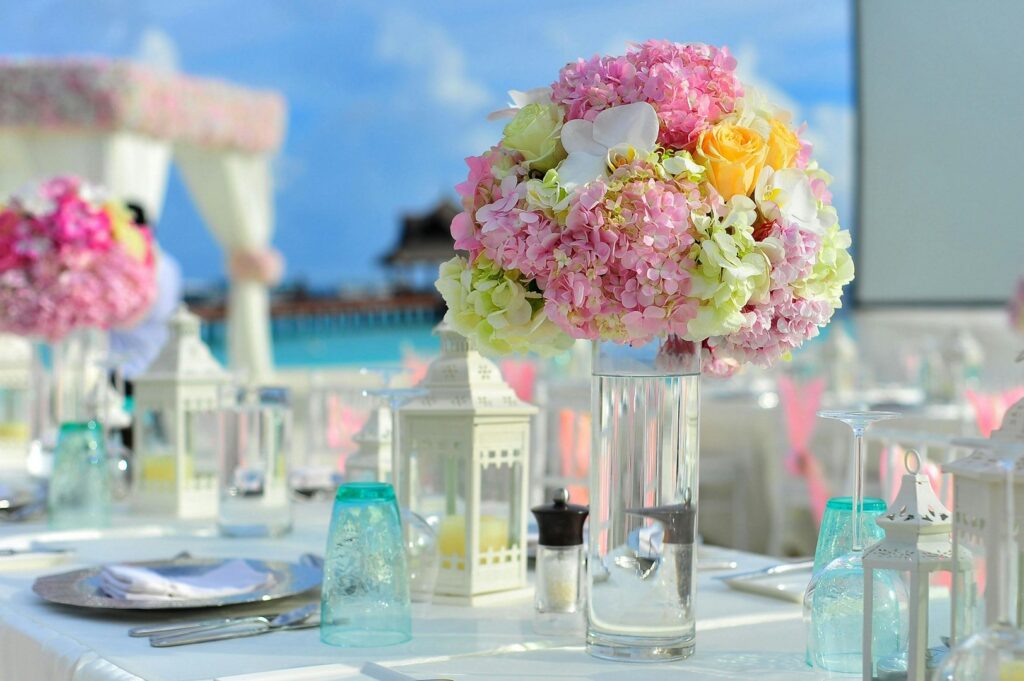 Beach wedding table centerpiece with pastel hydrangeas by Saraya D Decor Adelaide