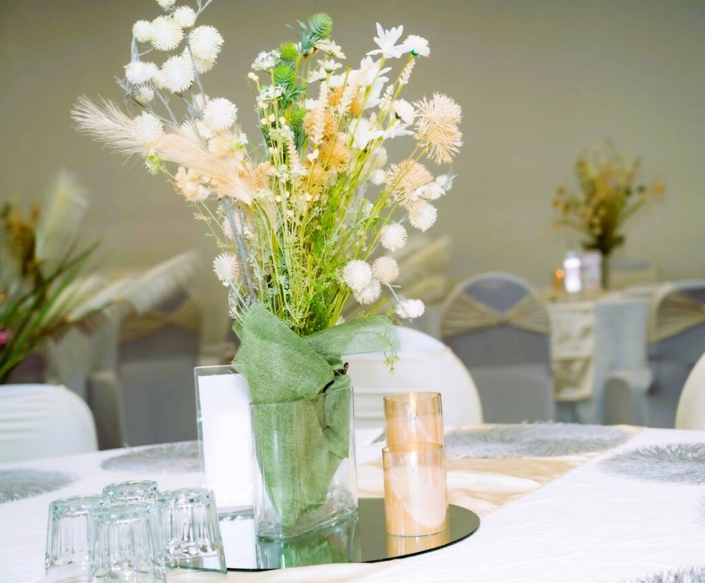 Elegant table centerpiece with dried florals and candles by Saraya D Decor Adelaide